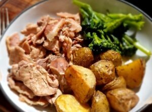 Rabbit and Bacon casserole with potatoes and buttered greens